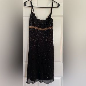 Black formal strapped dress with bronze sequence work